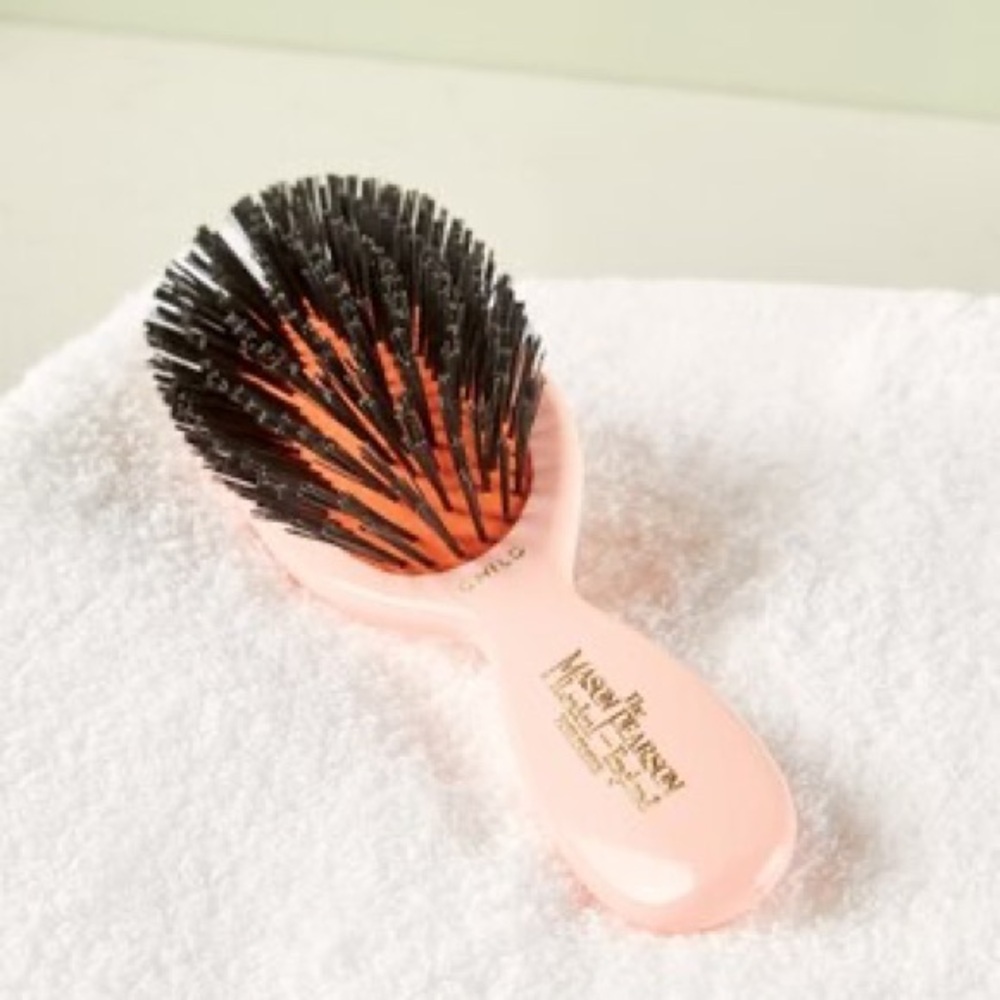 Elegant Coral Hair Brush with Black Bristles